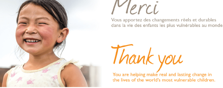 The top portion of a tax receipt is shown with a smiling child and the words "Merci" and "Thank You".
